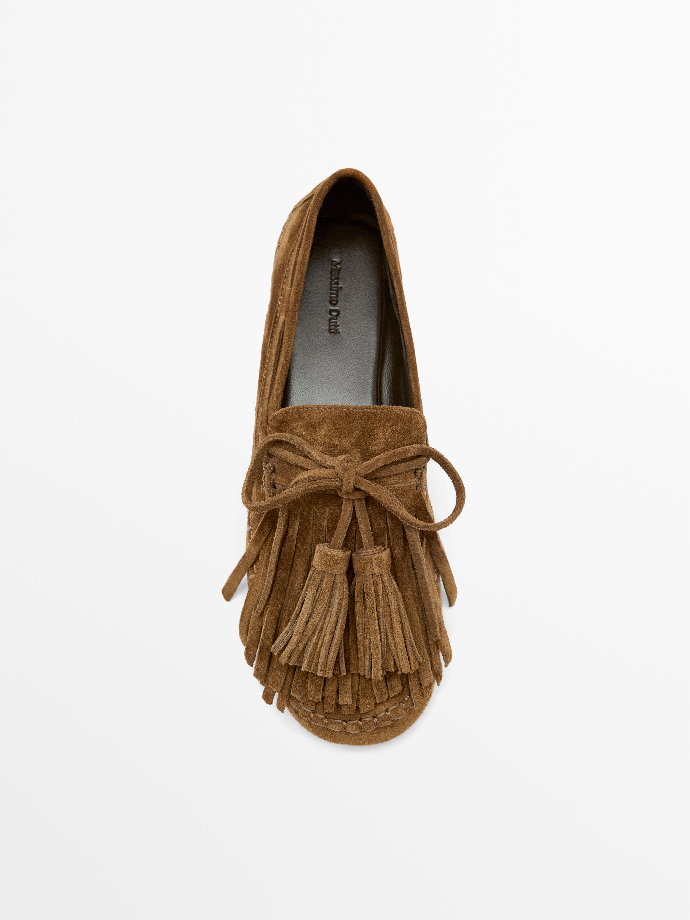 Mocassin à franges et pompons en croûte de cuir
